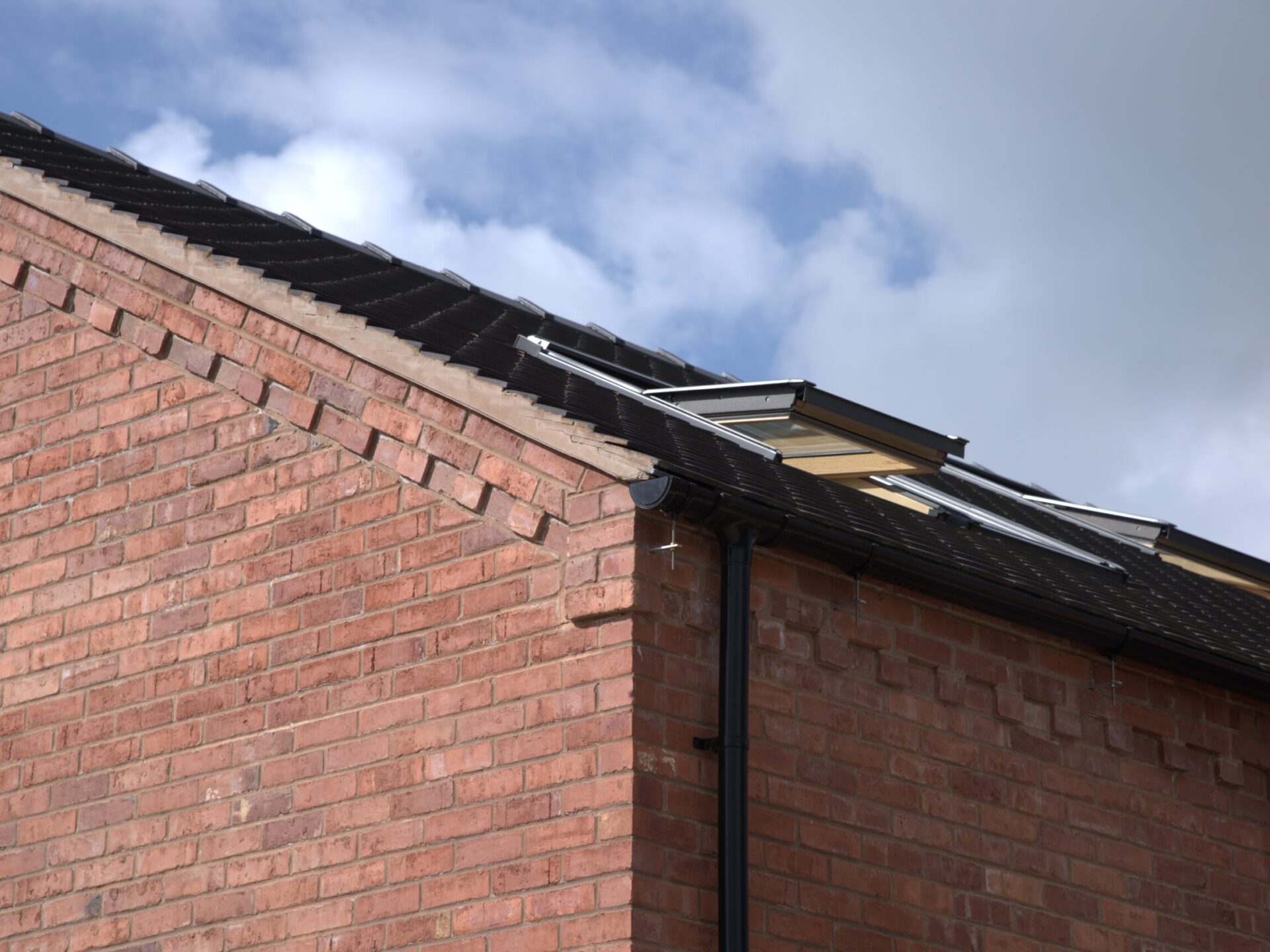a close up showing the verge and eaves corbel brick detailing