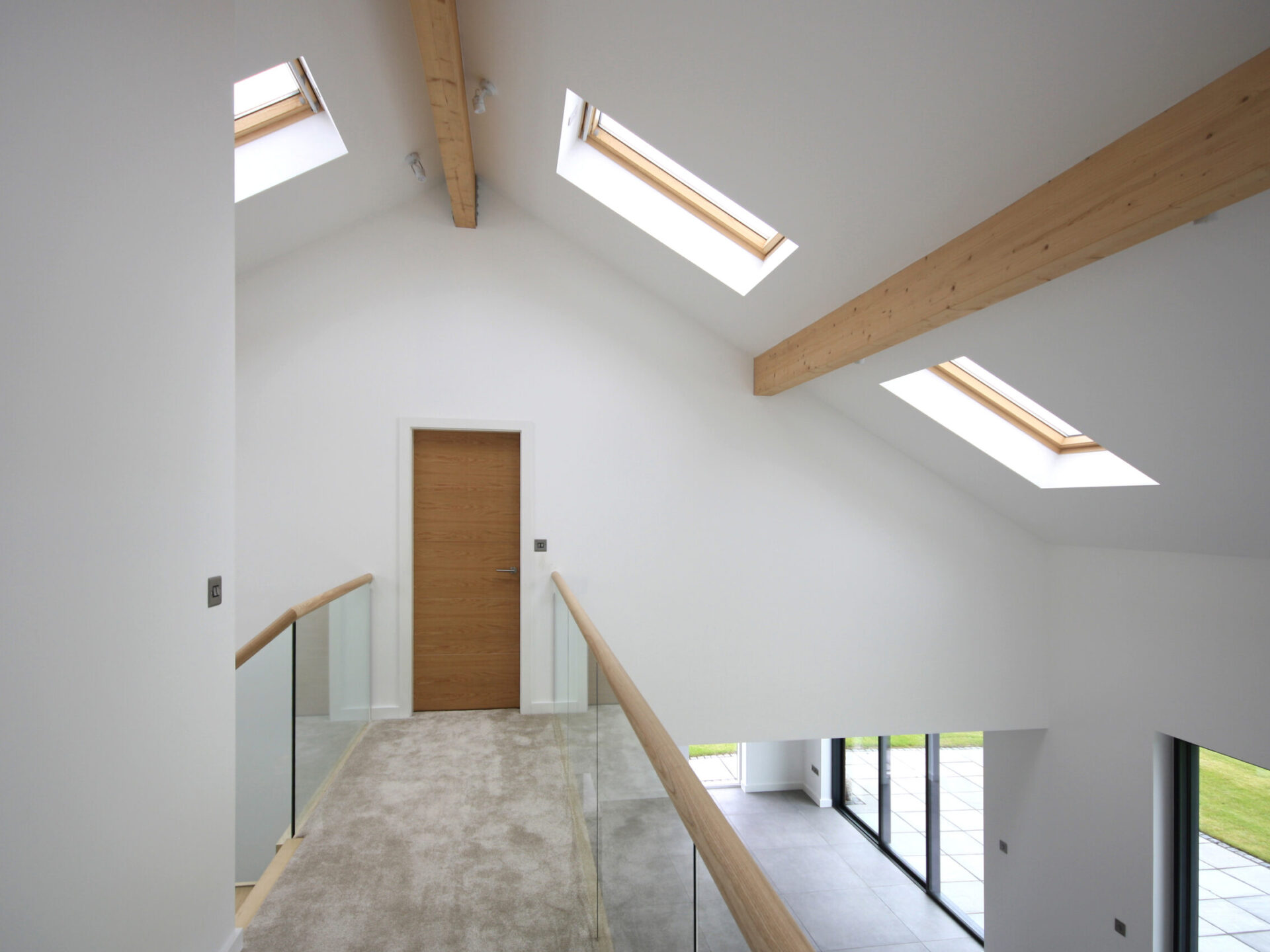 first floor landing of bay tree barn showing a door into the bedroom