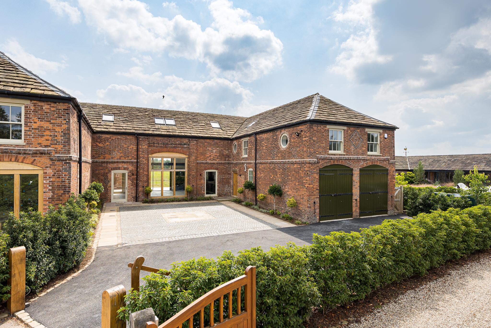 image of the coach house unit 1 with the old courtyard which provides access for both unit 1 and 2