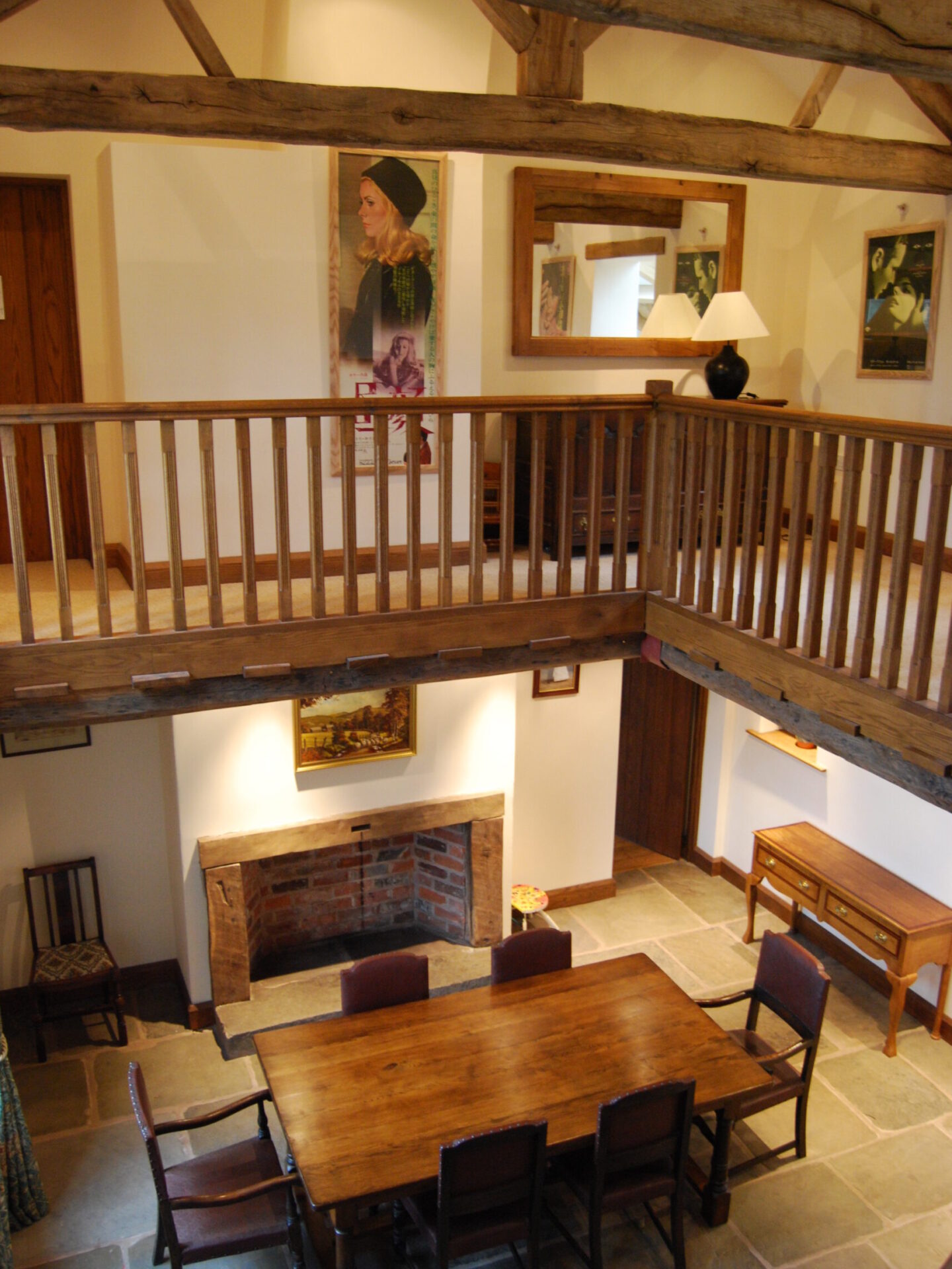 double height hall with galleried landing and dining area below
