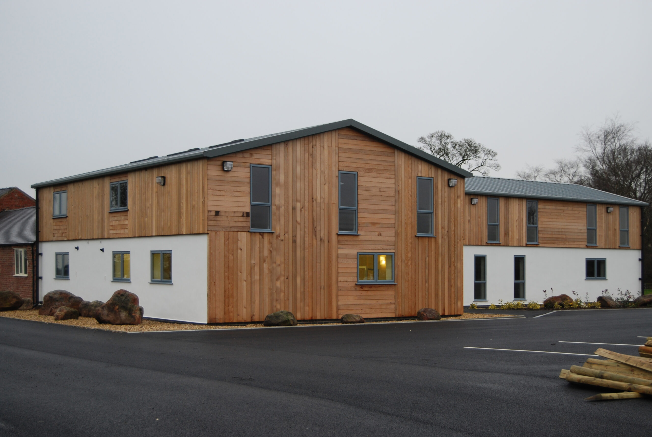 Timber cladding and rendered finish to barn conversion