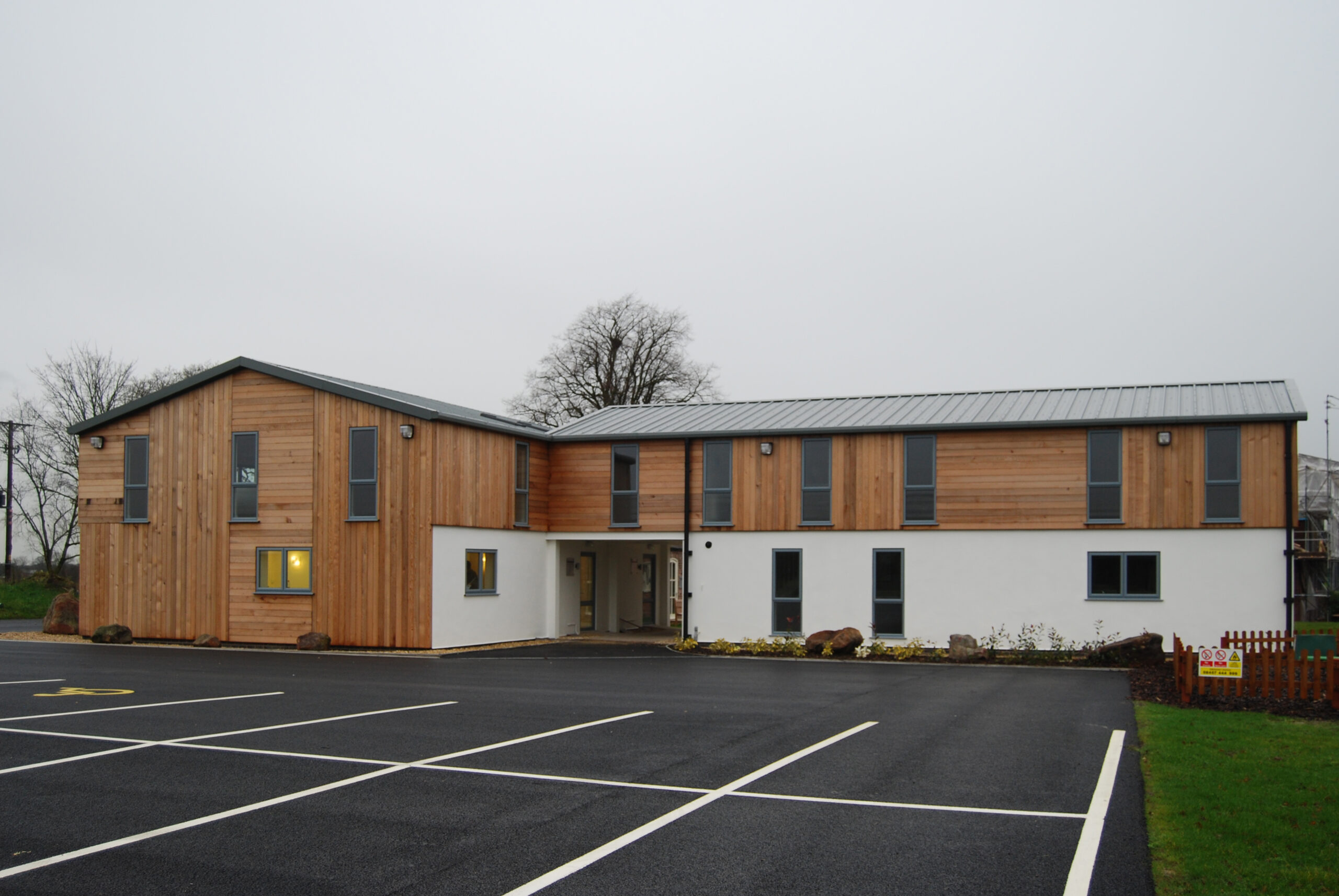 Timber cladding and rendered finish to barn conversion