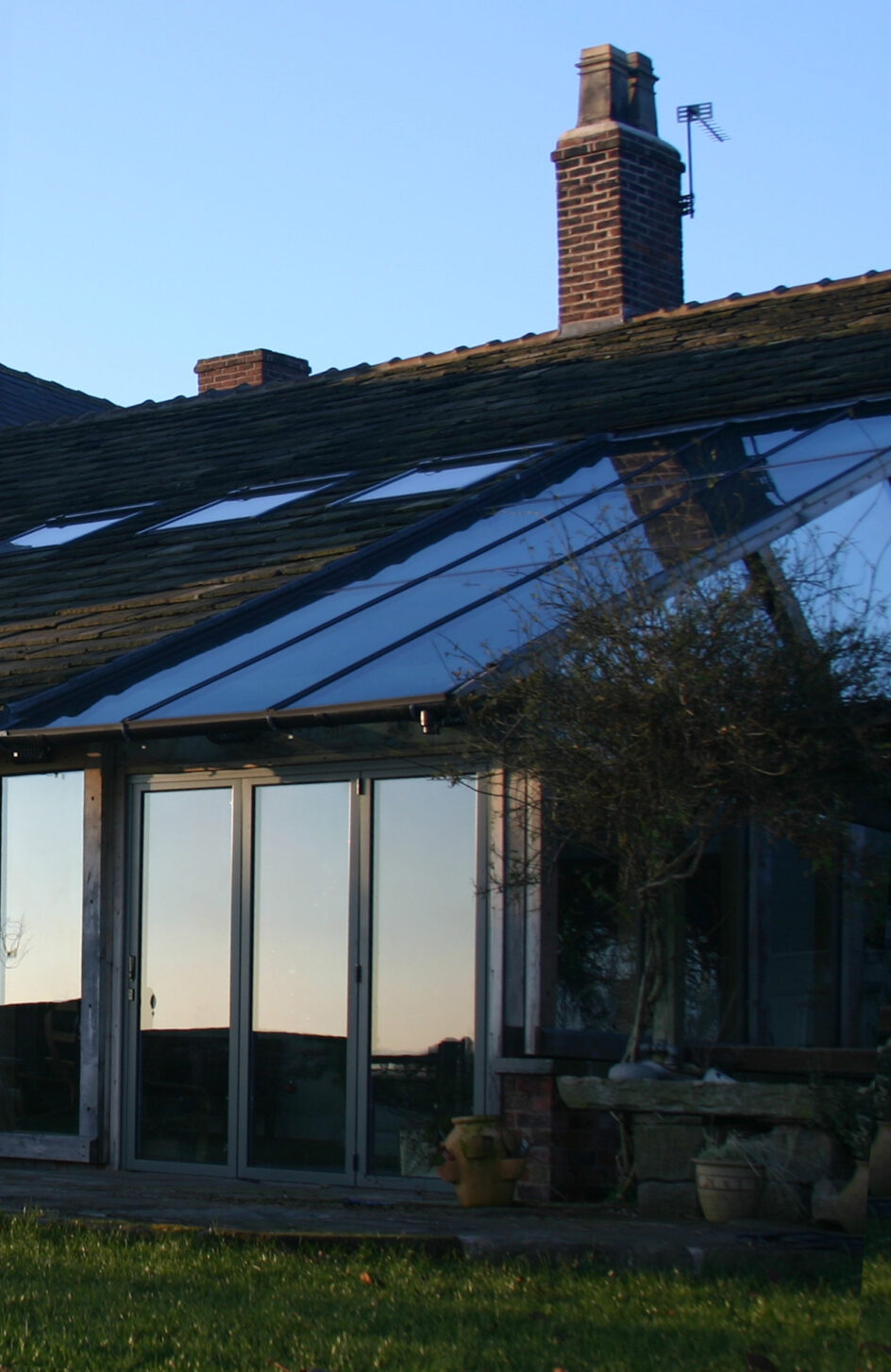 full height glazing and roof glazing to new rear extension