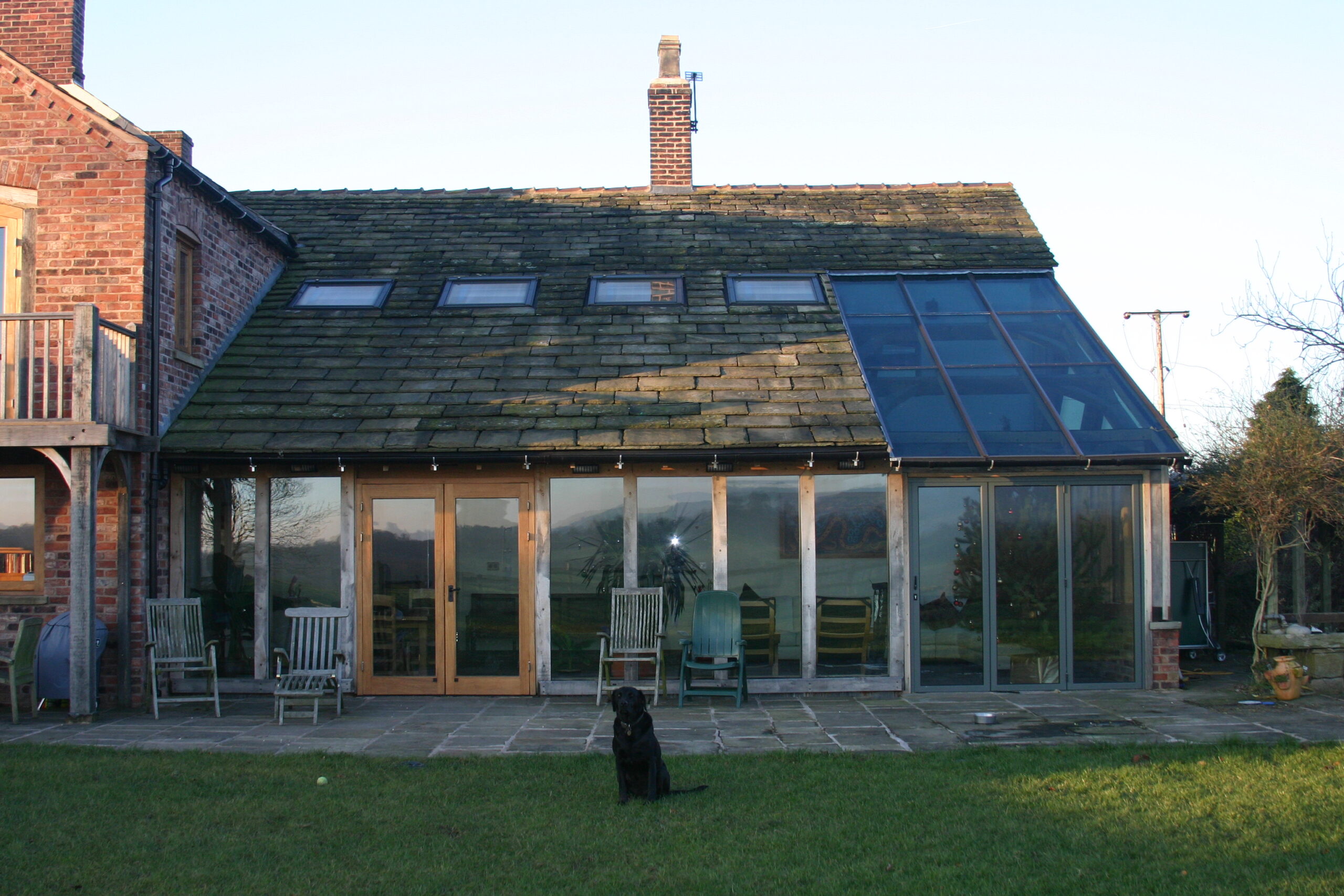 oak framed fully glazed garden room extension with rooflights and roof glazing