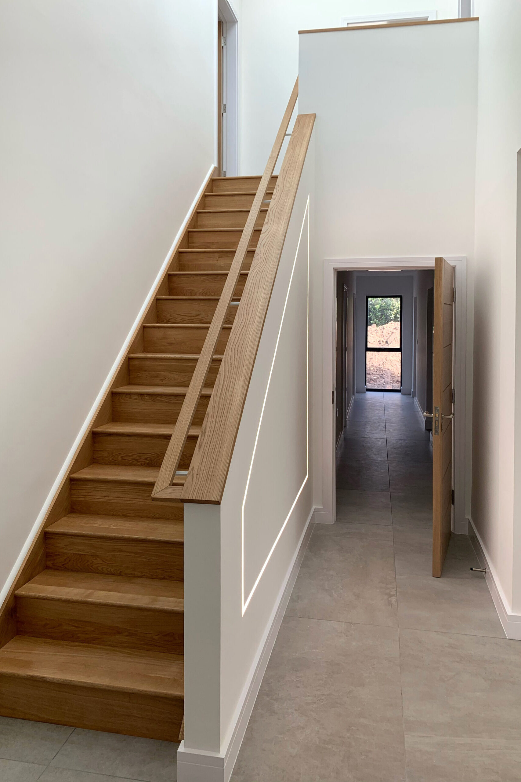 timber staircase with bespoke timber handrail