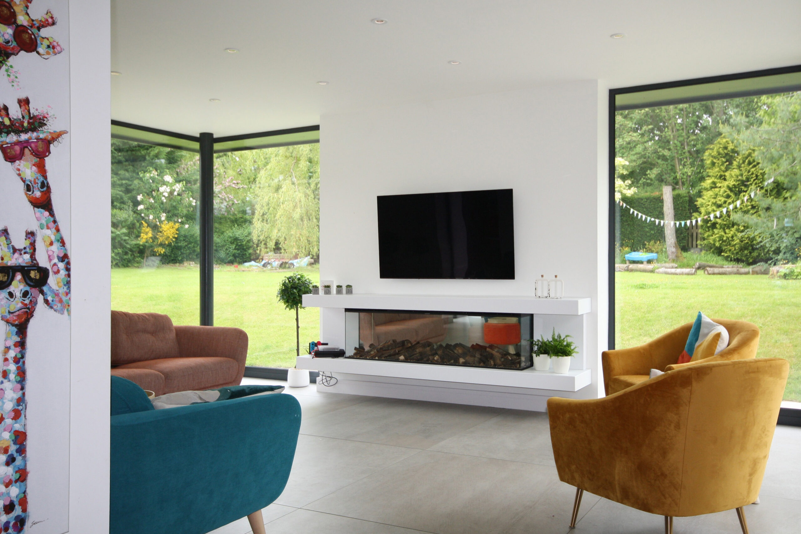 full height corner glazing in the living room with views into the rear garden