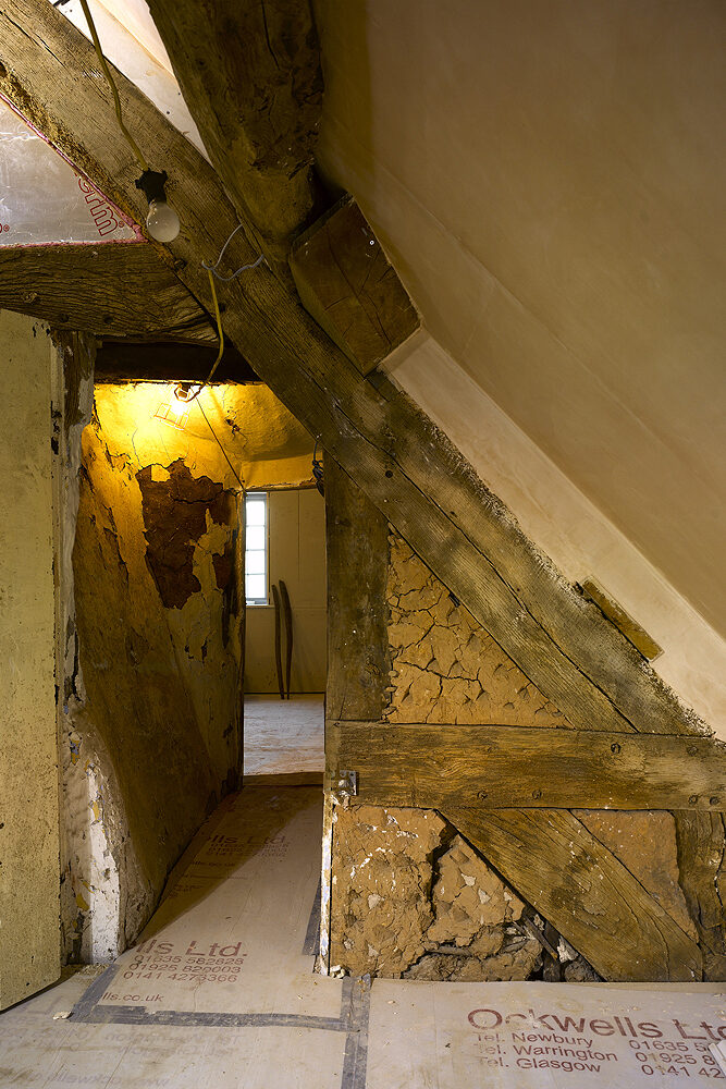 conversation process showing the retained timber structure with insulation infilling the timber