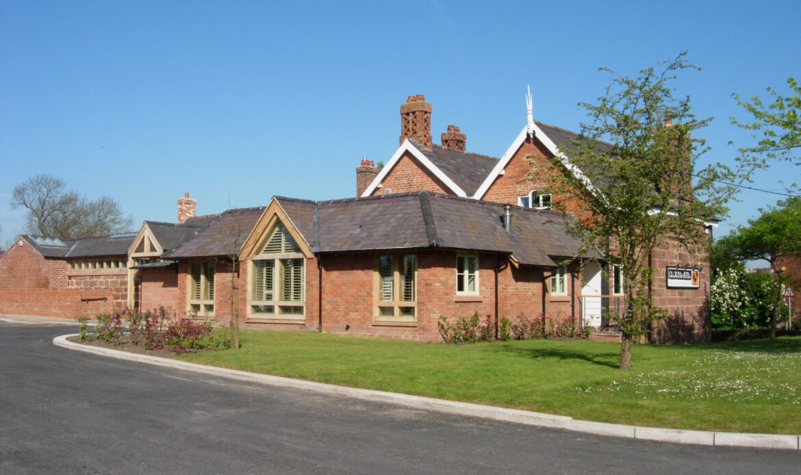 view of restaurant/pub with new brick extensions with driveway