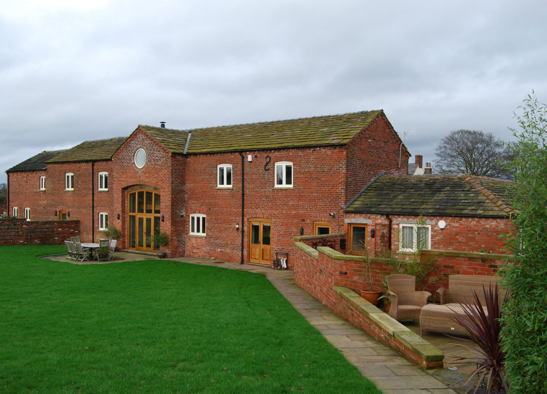 converted barns into three dwellings with original opening retained