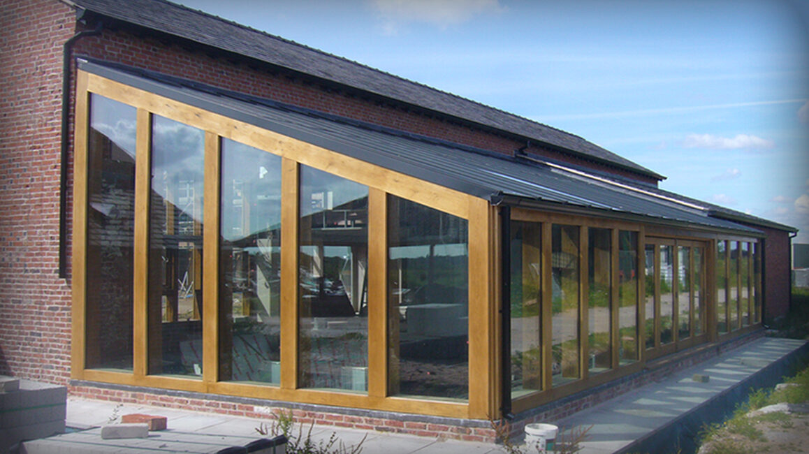 Gleave House Farm lean-to swimming pool oak framed lean-to containing the swimming pool at Gleave House Farm