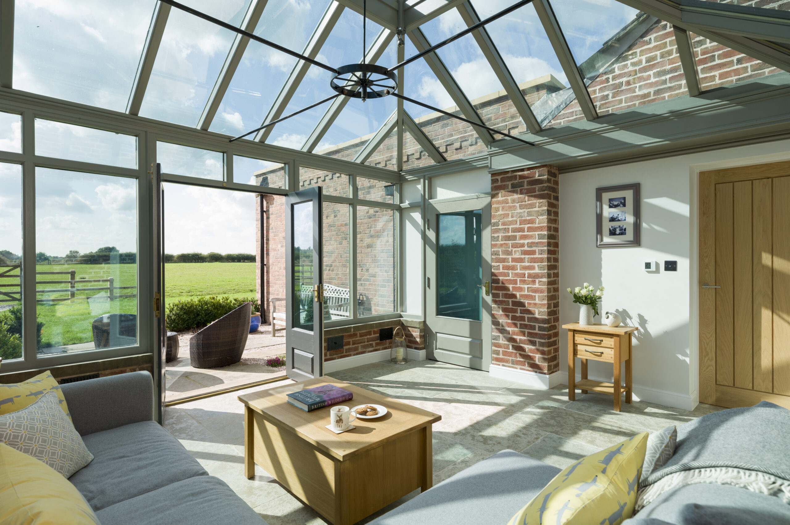conservatory with glazed wall and roof lantern