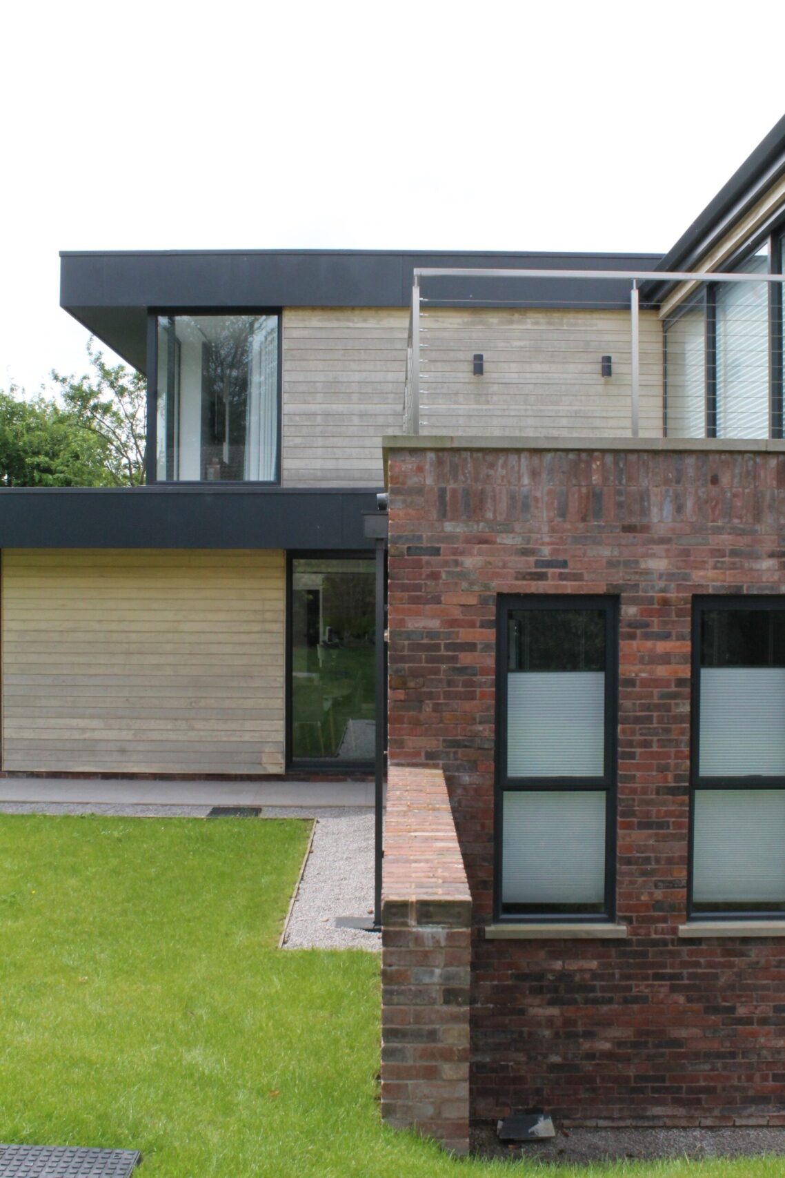 brick and timber cladding relationship in the side elevation at Sherwood