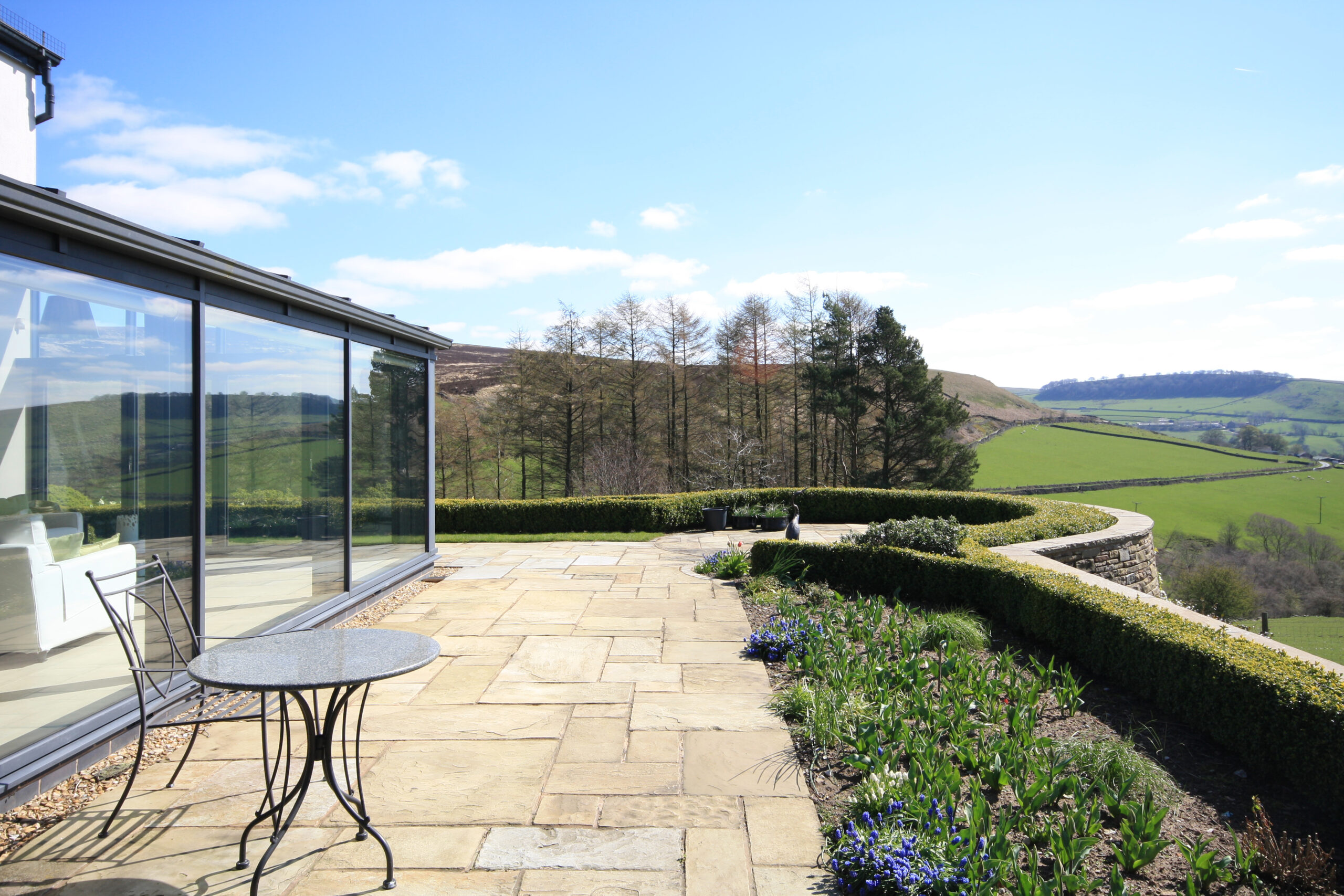 extraordinary surrounding views of the countryside from the elevated site at Heron Crag with large glazing areas to capture these from the dwelling