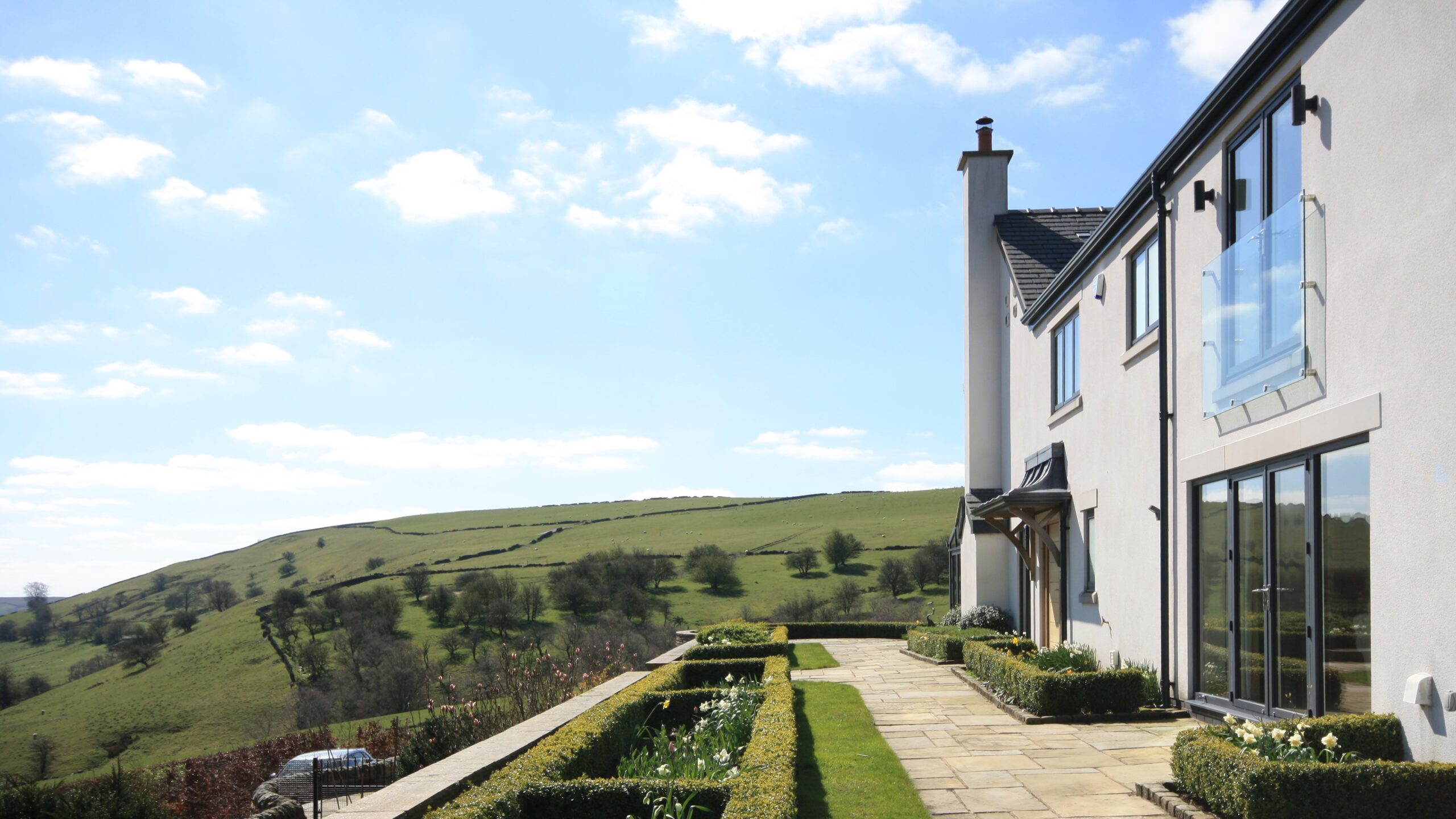 Heron Crag rear elevation with surrounding views of countryside