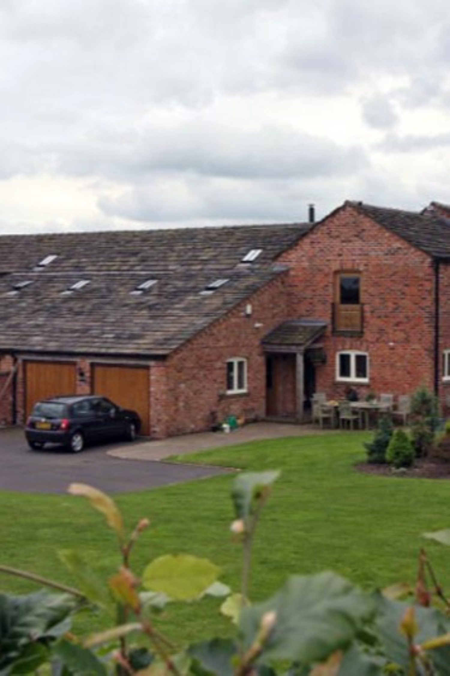 converted barns with new extensions added