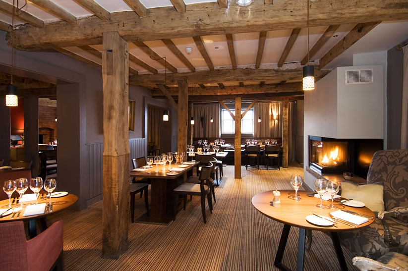 traditional restaurant at Cock O'Barton with exposed timber structure