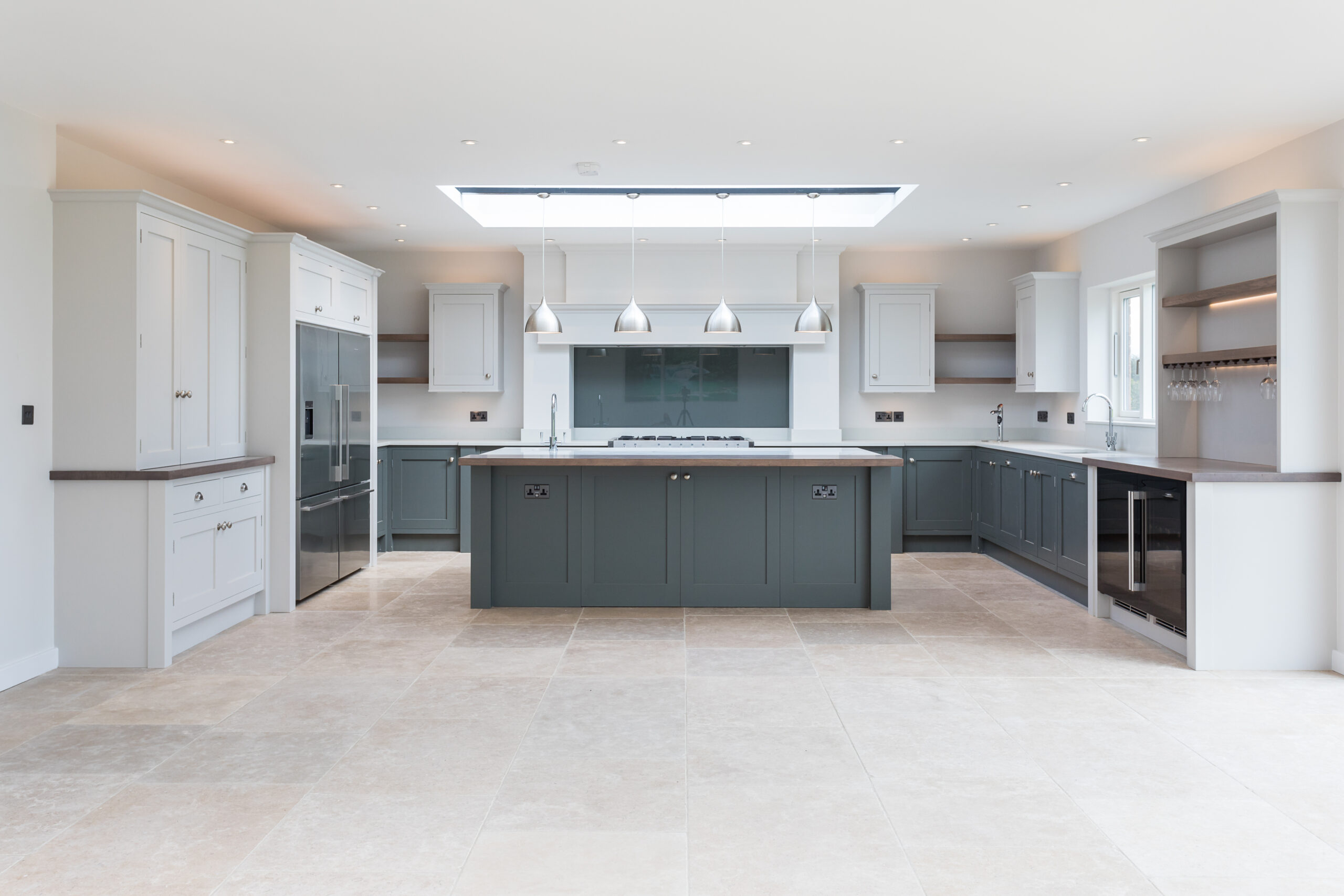 modern kitchen with roof lantern and pendant lighting