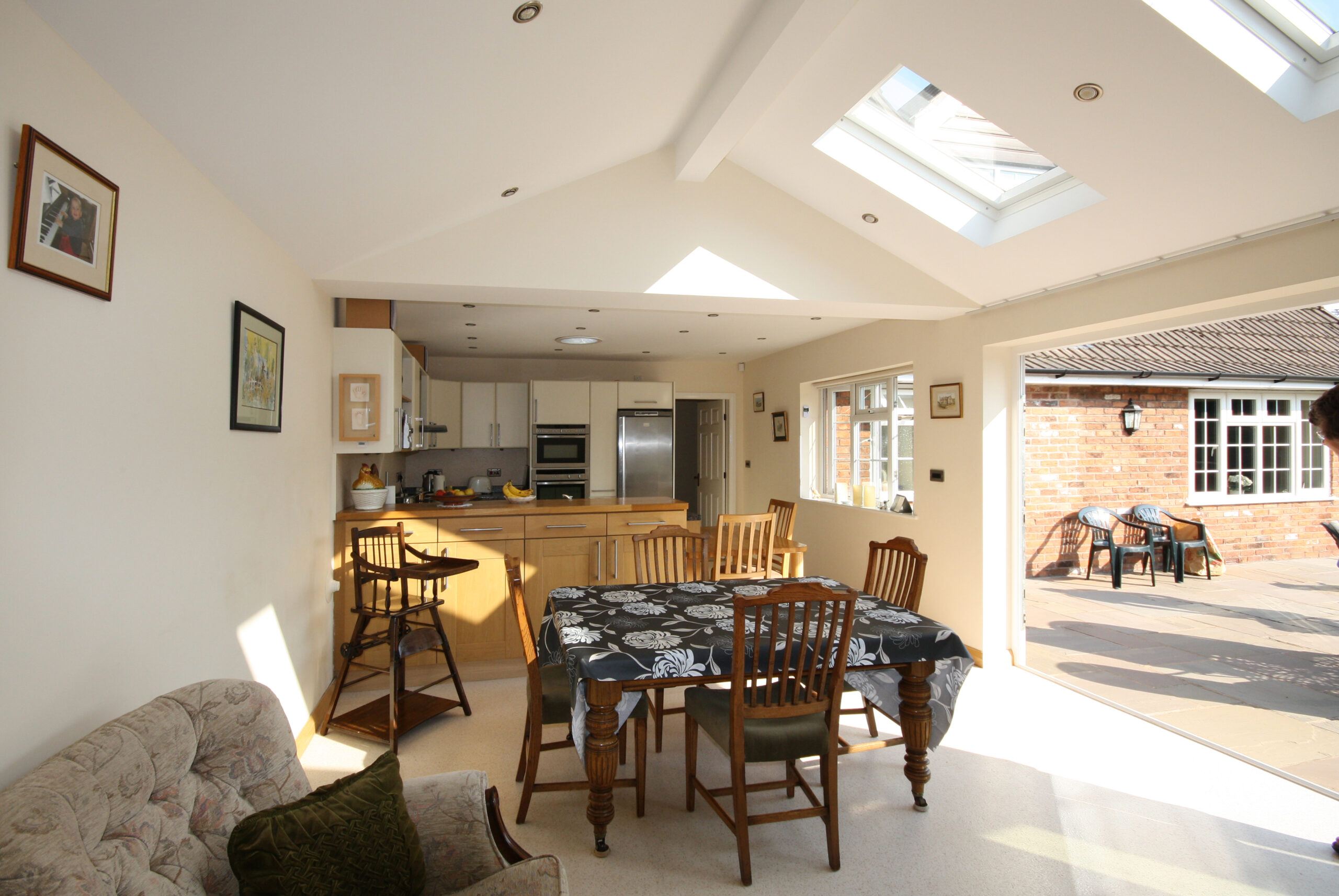 kitchen dining living room alterations and new single storey rear extension with large opening and rooflights
