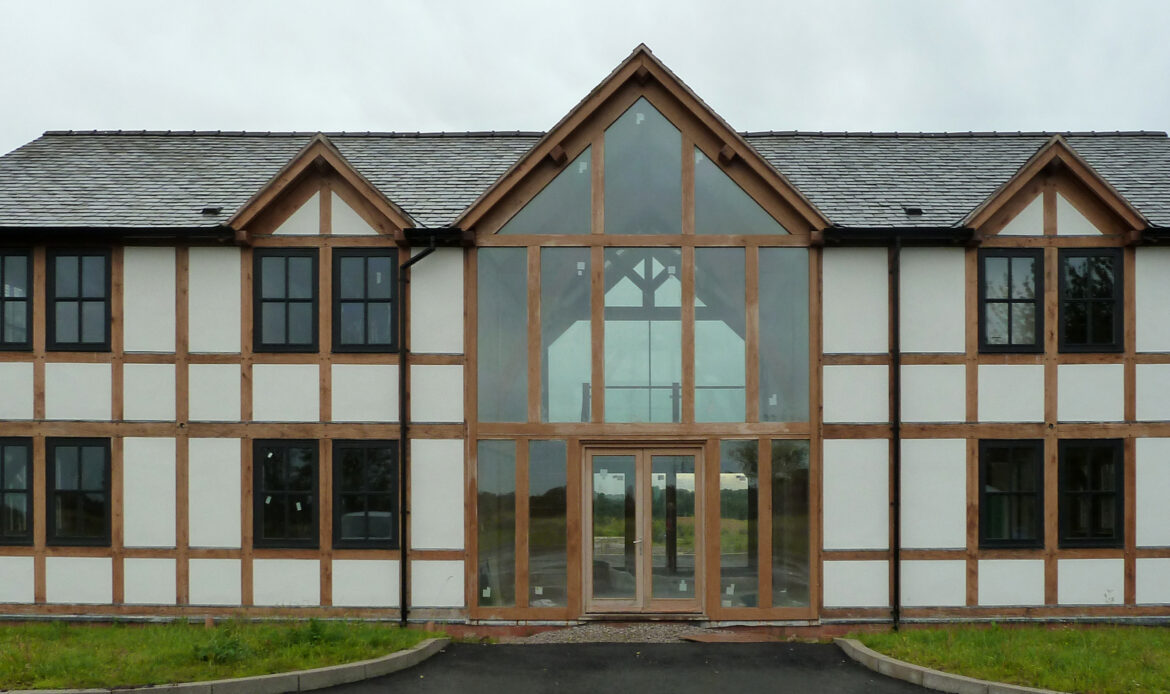 oak frame with rendered infill panels to Gleave House Farm front elevation