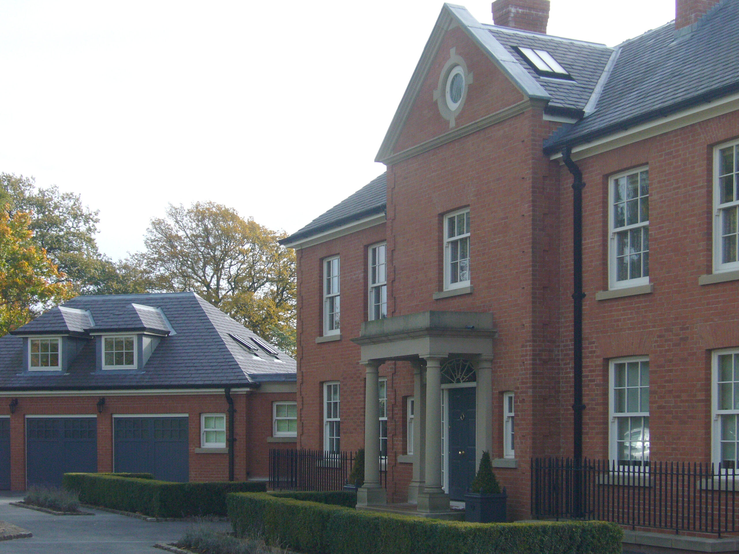 front entrance with detached garage