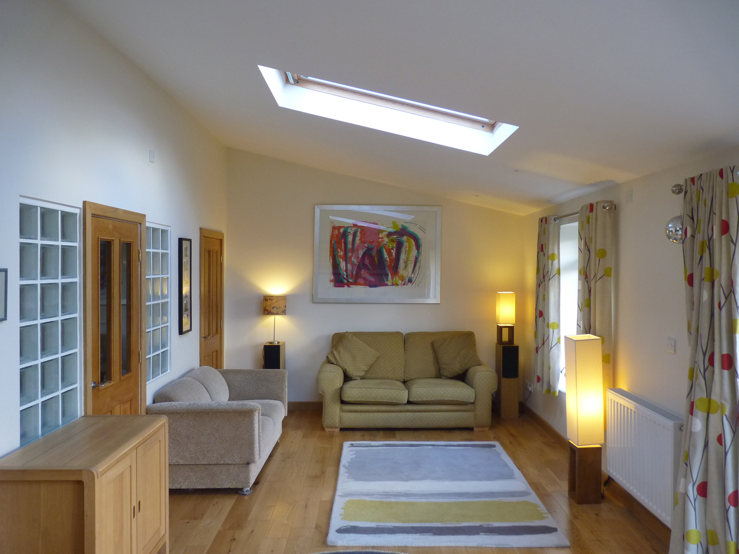 living area in single storey open-plan rear extension with rooflight