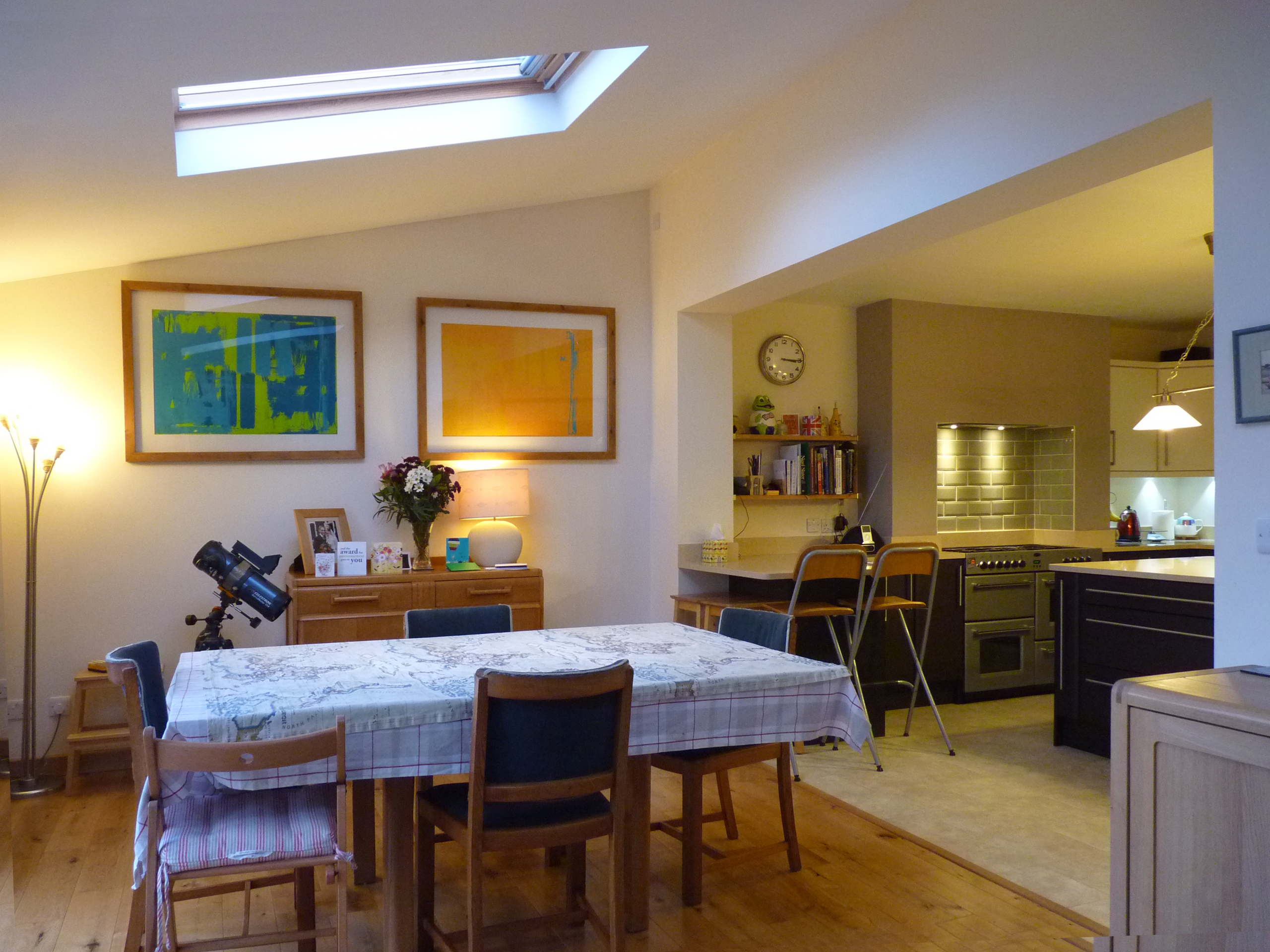 dining area in new single storey open-plan rear extension with rooflight over dining table