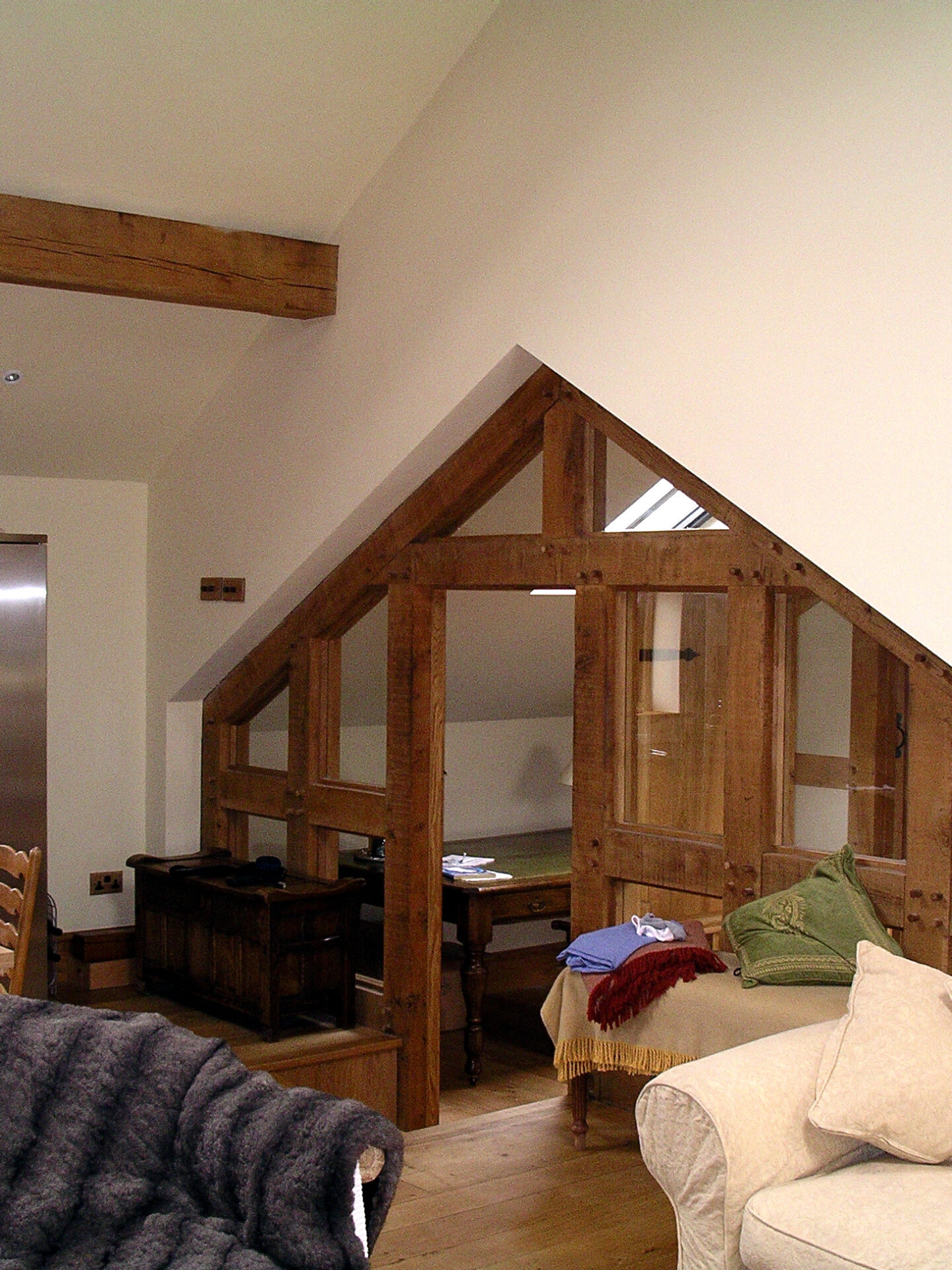 raked openings within the converted barn with oak framing