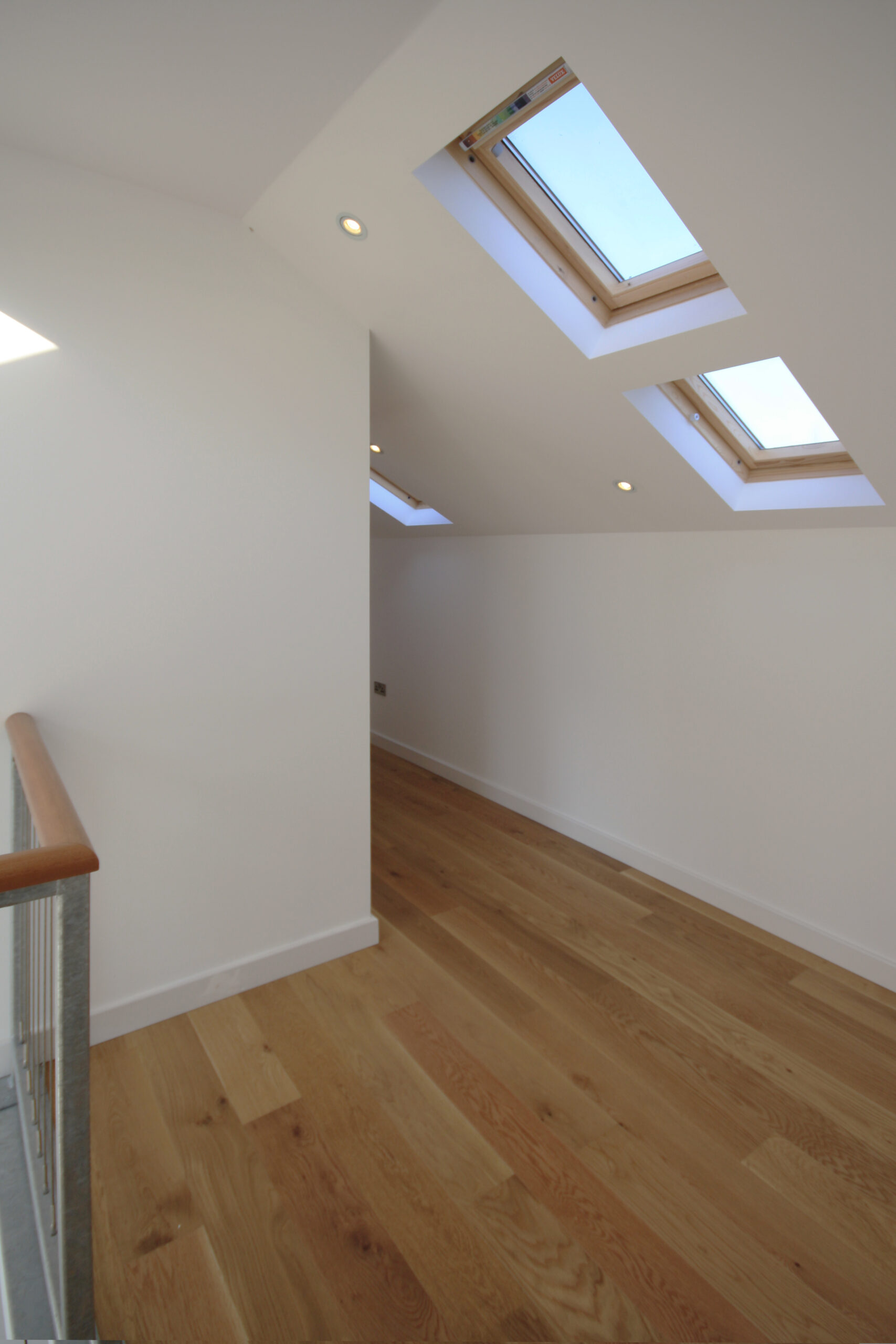 raked ceiling in landing with rooflights
