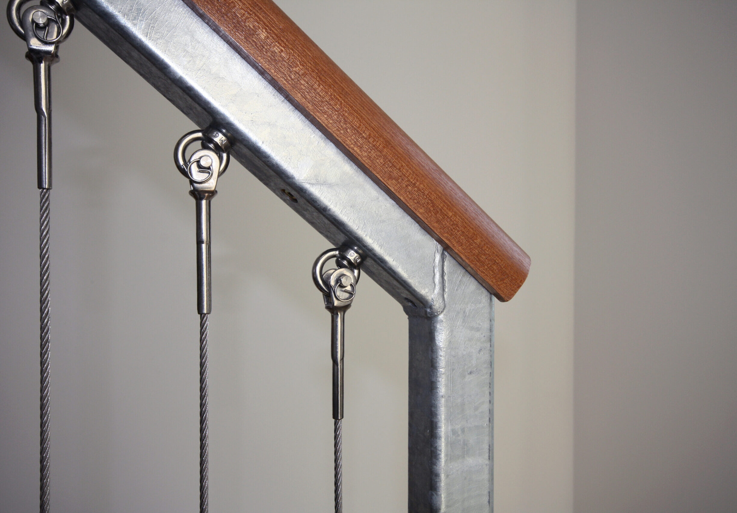 detail of the staircase handrail and balustrade with timber and steel