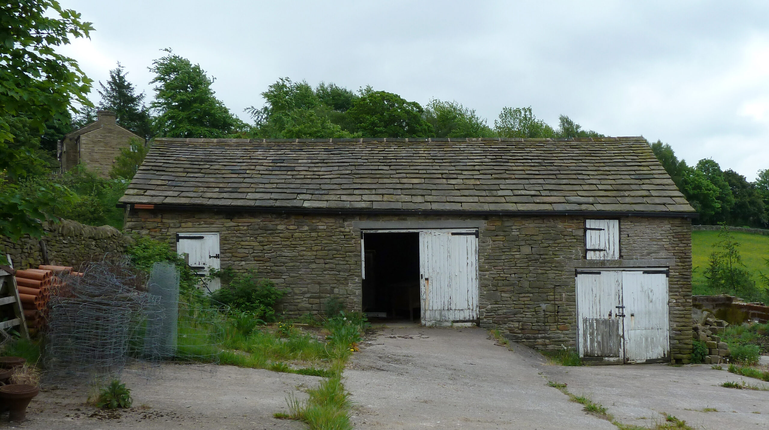 existing stone barn at Lower Brook Croft with split levels