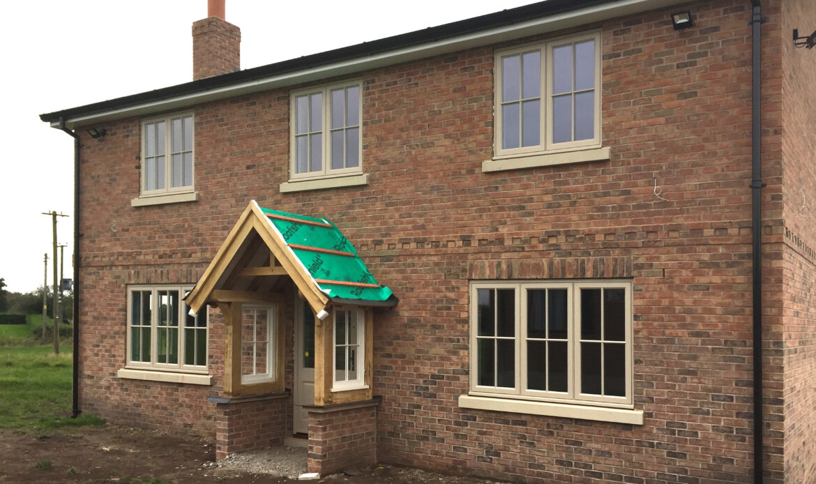 brick replacement dwelling with porch