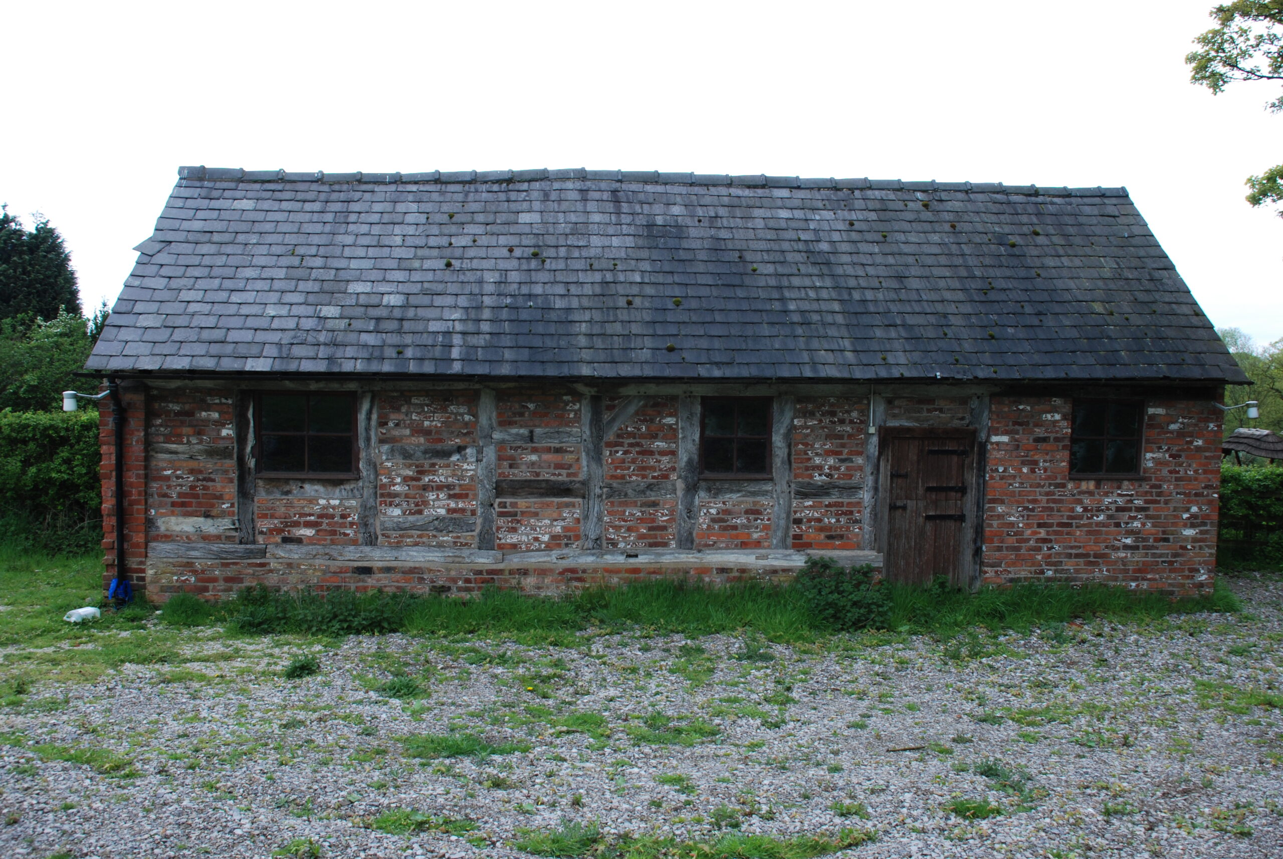 fourteenth century cruck framed barn before conversion