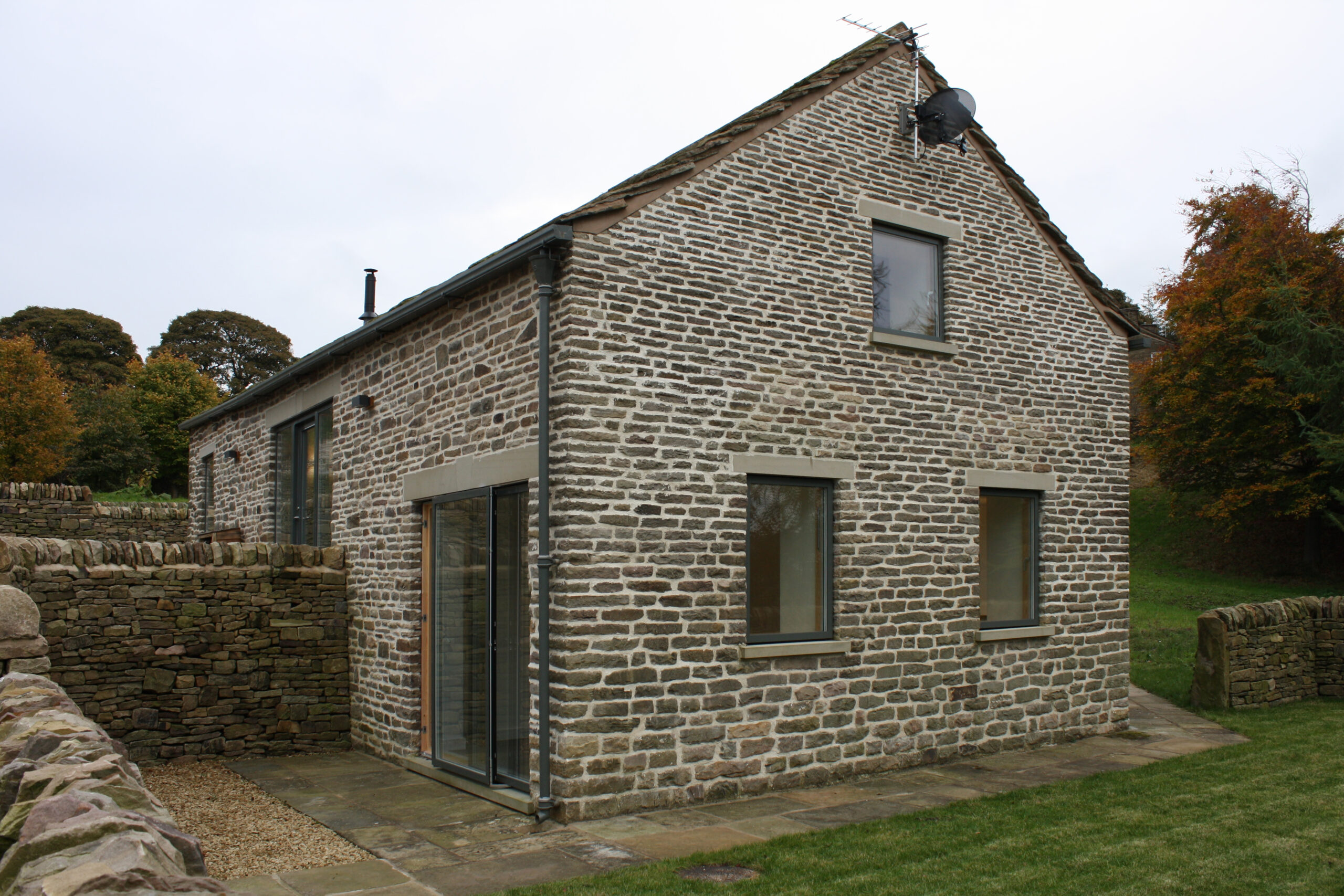 converted stone barn with retained openings