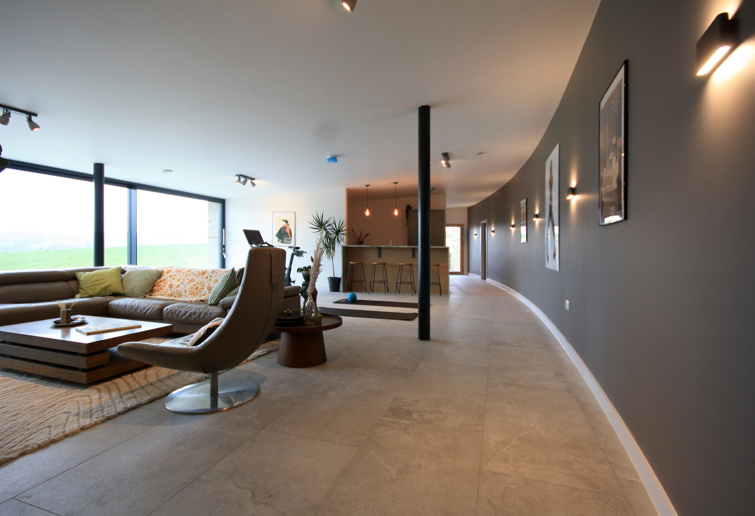 open plan space with sitting area, leisure suite and tea station