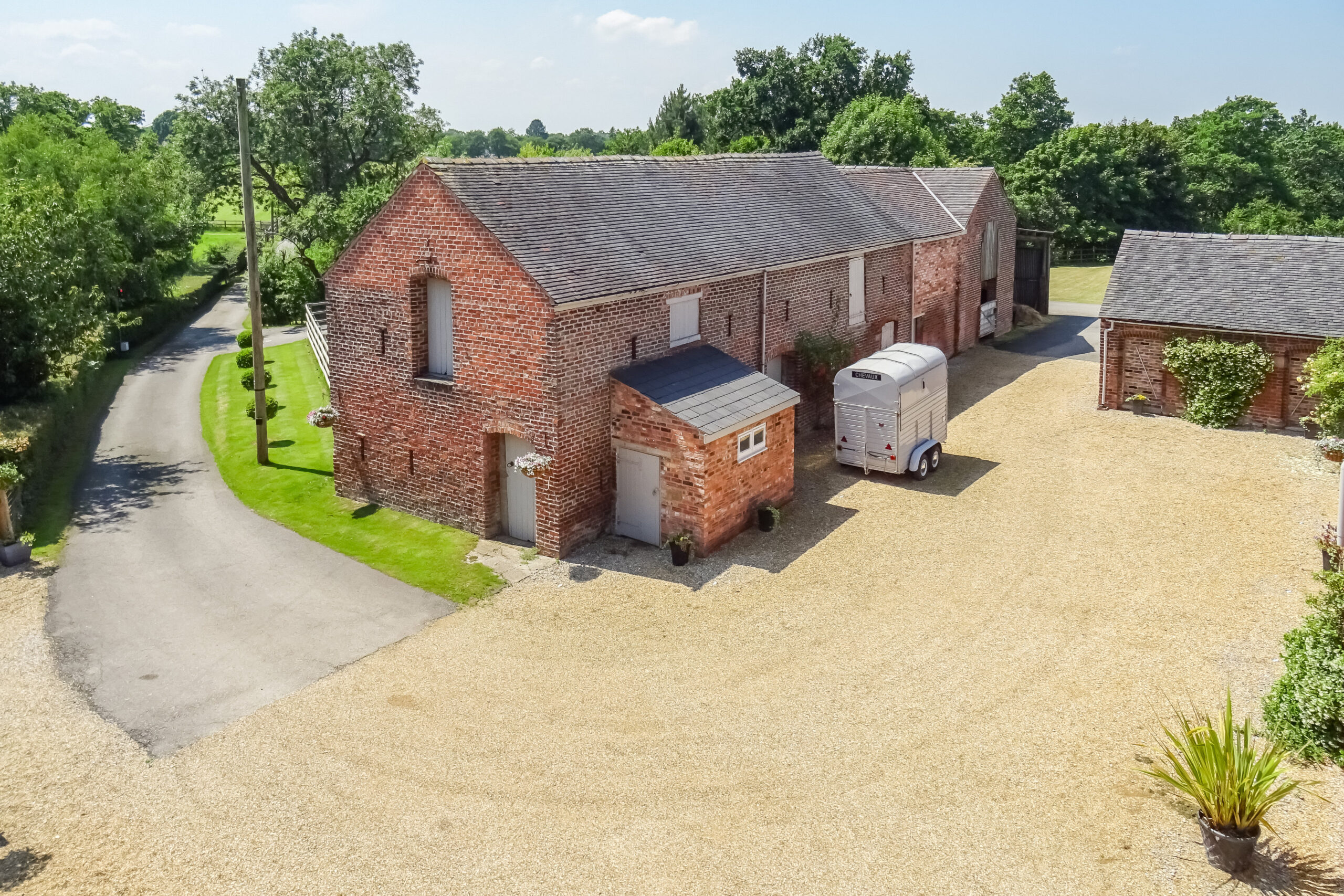 aerial view of existing brick barn