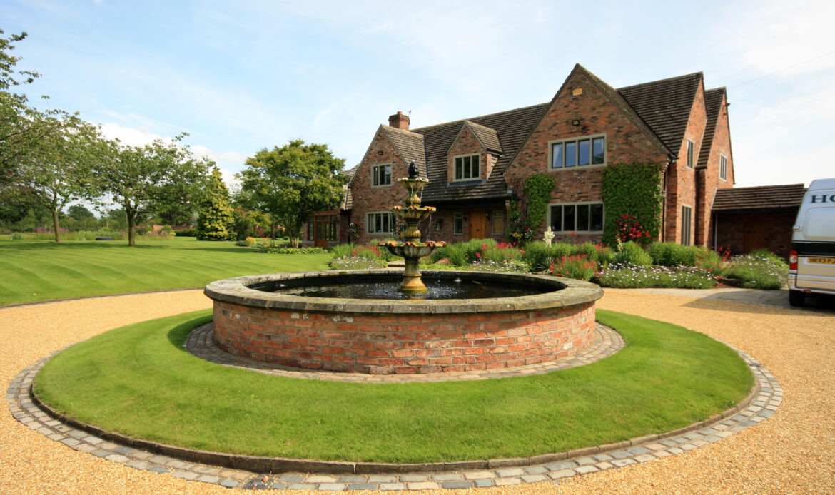 traditional front elevation of house with new extensions