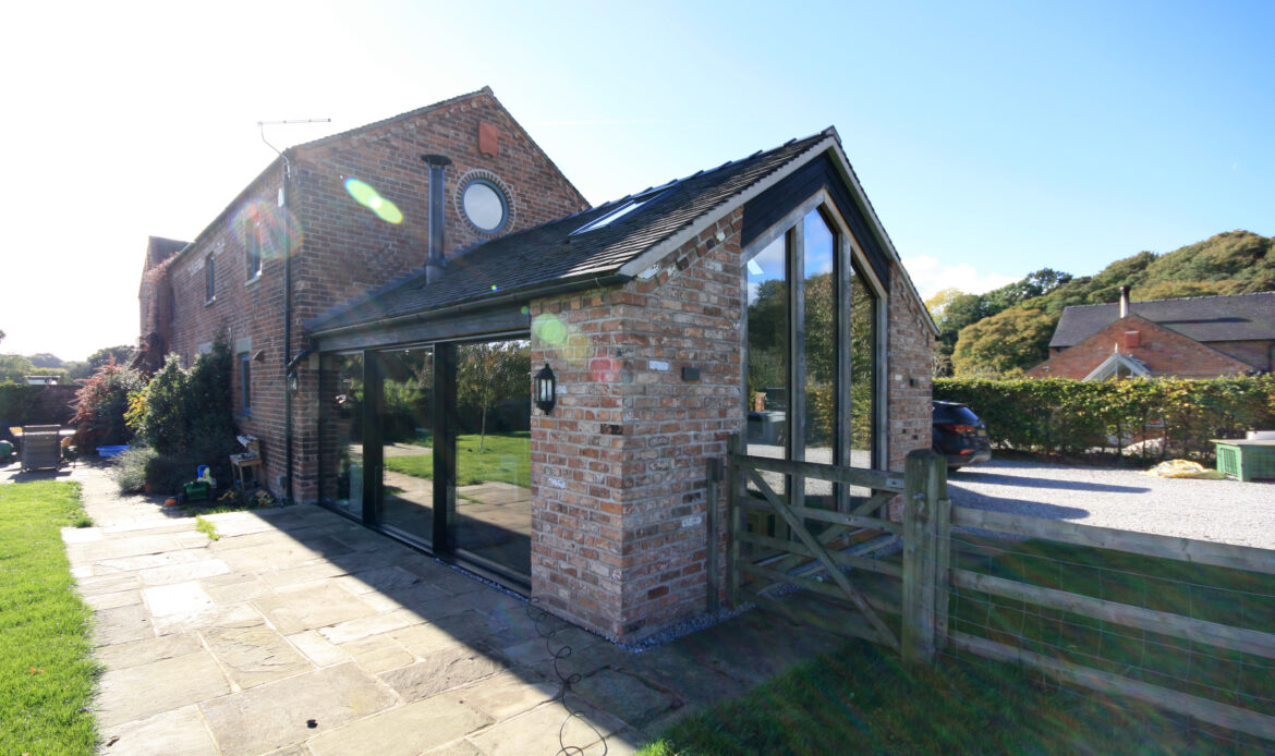 single storey extension to converted barn